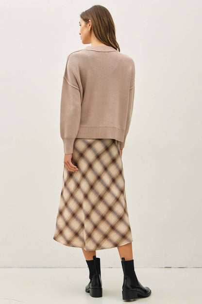 Ribbed knit sweater with raw seam details