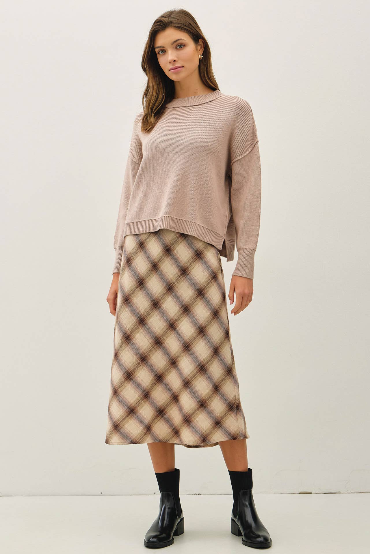 Ribbed knit sweater with raw seam details