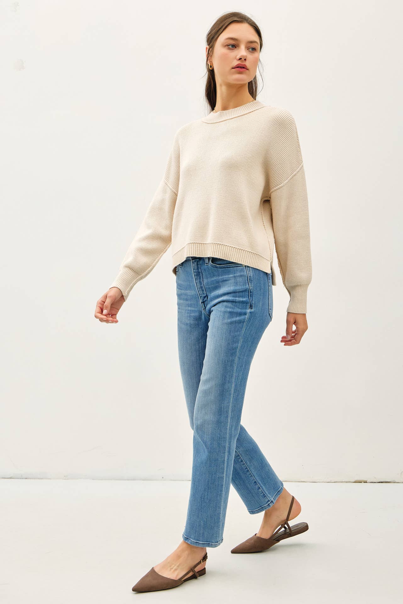 Ribbed knit sweater with raw seam details