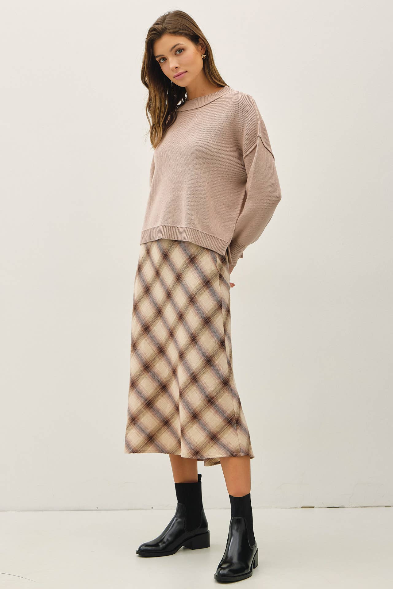 Ribbed knit sweater with raw seam details